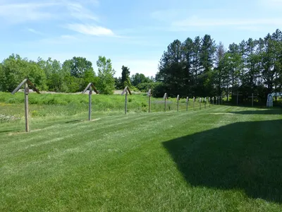 Outdoor stations along left side of the chapel.