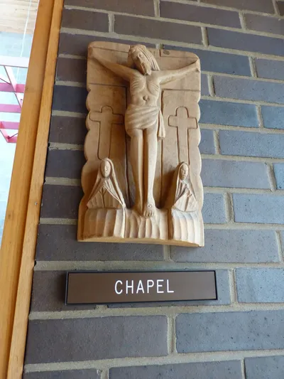 Relief outside chapel.