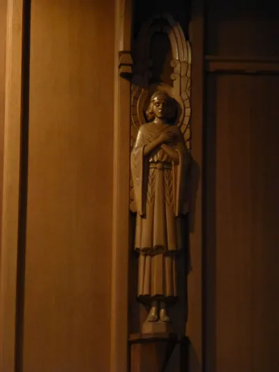 Angel carving in reredo.