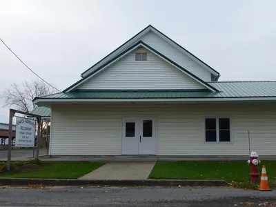 Exterior. The front has been significantly modified since the church was sold.