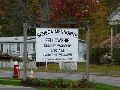 Sign of the current occupants of the former Sacred Heart church.