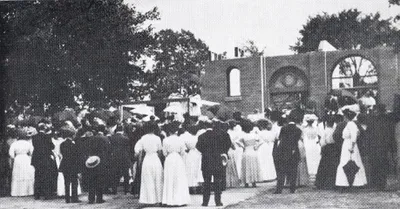 Laying of cornerstone for original church/school, July 9, 1911. This building still stands across the street from the present Cathedral. Source: History of Sacred Heart Parish