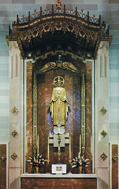 Excellent photograh of the high altar and reredo. Source: History of Sacred Heart Parish