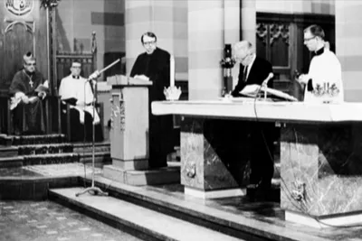 Bishop Kearney seated at cathedra. Source: Video history of Sacred Heart Cathedral