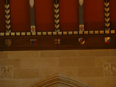 Crests along ceiling.