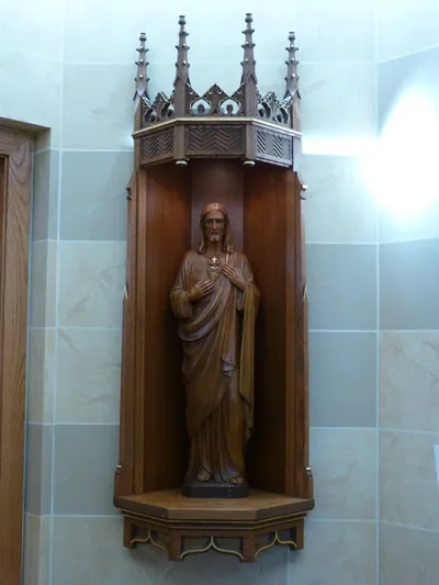 Statue of the sacred heart outside of confessionals.