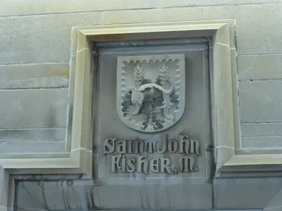 St. John Fisher crest.
