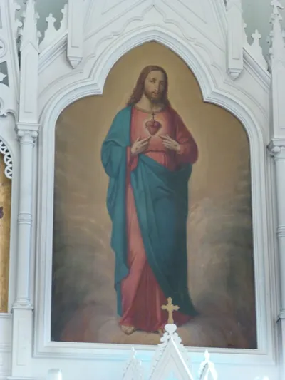 Sacred Heart painting atop high altar.