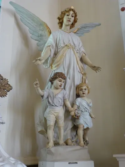 Angel with children statue.