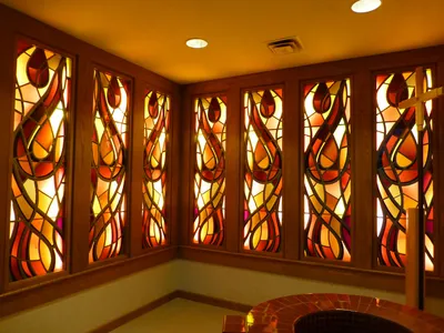Backlit stained glass in baptistry.