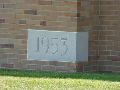 Cornerstone on school building.
