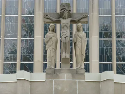 Crucifix atop church front.
