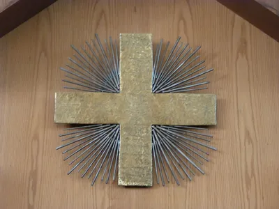 Cross atop main entrance.