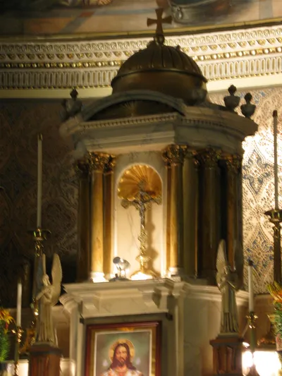 Crucifix and dome atop high altar.