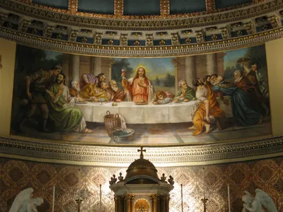 Painting of the Last Supper on sanctuary wall.