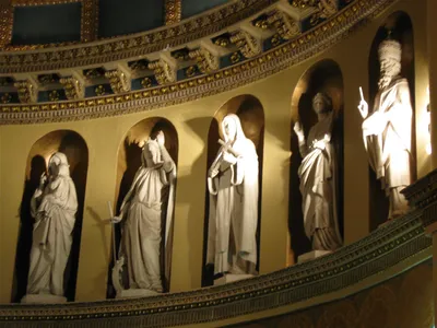 Statues along santuary wall.