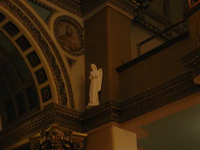 Angel next to choir loft.