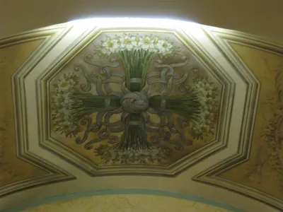 Painting on ceiling above left side altar.
