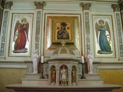 Artwork above side altar.