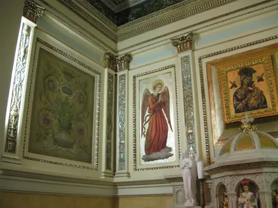 Artwork above side altar.