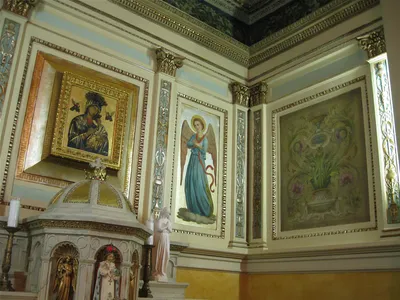 Artwork above side altar.