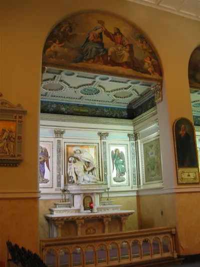 Side altar with piata.