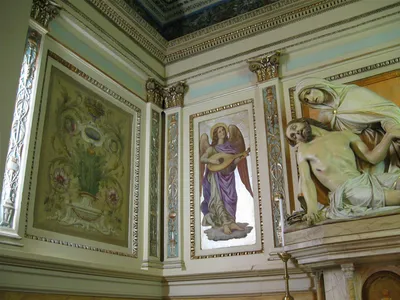 Artwork above side altar.