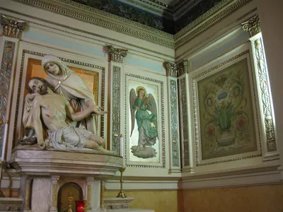 Artwork above side altar.