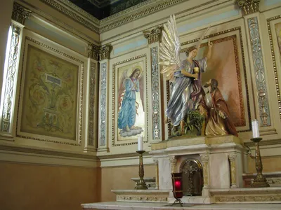 Artwork above side altar.
