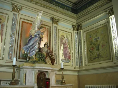 Artwork above side altar.