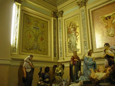 Artwork above side altar.