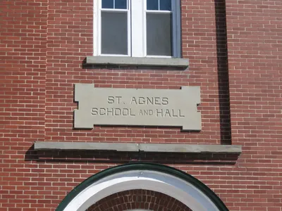 Sign on school building.