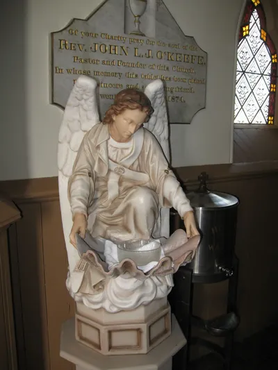 Angel holy water font.