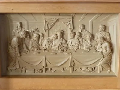 Last Supper relief on altar.