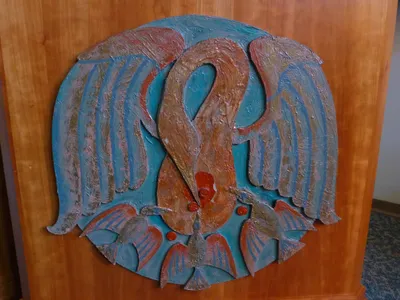 Pelican relief on altar.