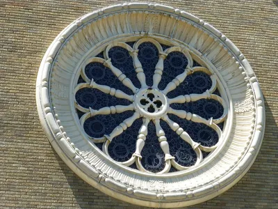Rose stained glass window from outside.