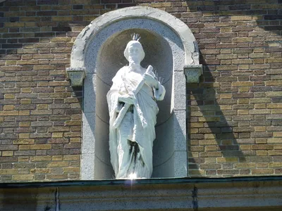 Statue of St. Andrew atop former school. (I assume the barbs are meant to keep birds away)