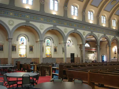 Left side of the church.