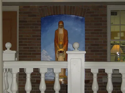 St. Anne statue in gathering space.