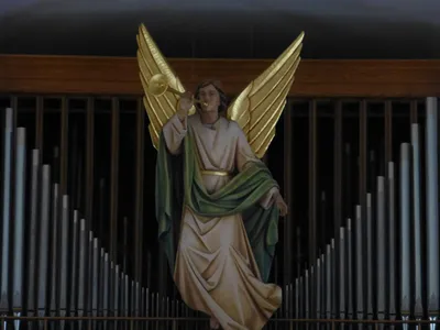 Angel statue in choir loft.