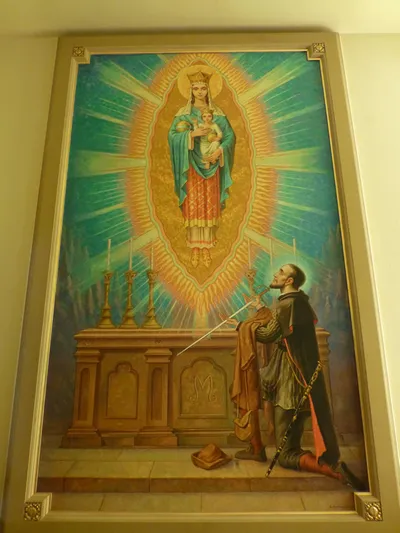 Very large and impressive painting of St. Ignatius and Our Lady.
