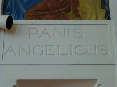 "Bread of the angels" inscription.