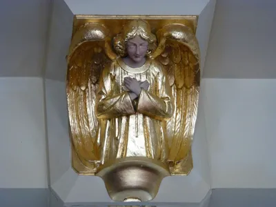 Angel relief along the columns.