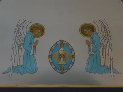 Painting on wall above sanctuary.