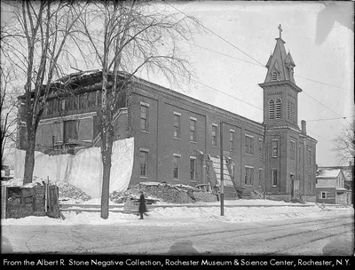 The original St. Anthony church located at the corner of Lyell and North Plymouth (today a bank is there). This photograph was taken in 1919 and depicts the transformation of a former Rochester school into St. Anthony church. Source: Albert Stone collection