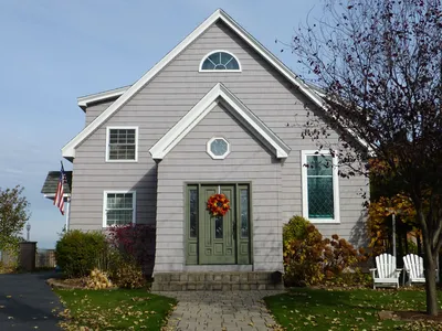 Chapel today as a private home. Several additions and modifications have been made to the structure. It looks like one of the original windows still exists to the right of the door.