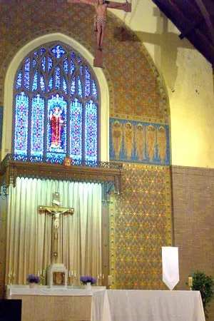 View of altar, high altar, and suspended crucifix. Source: Rochester Pluralism Project (defunct)
