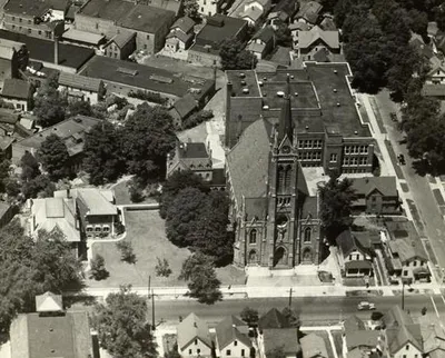 Nice aerial photograph of the St. Boniface campus. Two houses once stood on the spot of the present parking lot. Source: Rochester Public Library