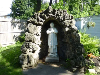 Statue behind convent.