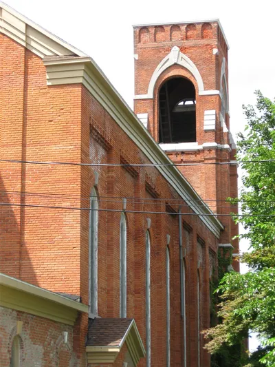 View of the bell tower and left side of the church.